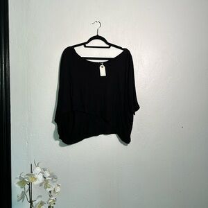 Loose black top with boat neck